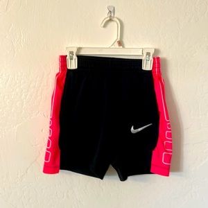 Nike dry-fit, girl black and pink shorts. Size: Small. Good as new.